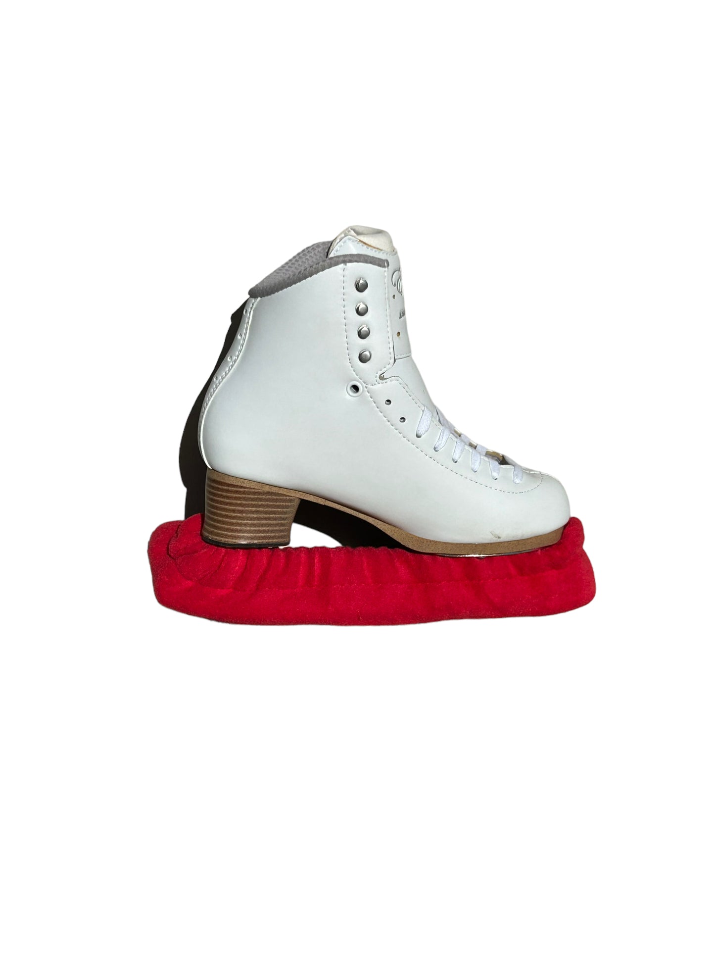 A pair of Skating Eleganza Terry Soakers in soft terry cloth fabric, shown covering skate blades to prevent rust and damage. Red.