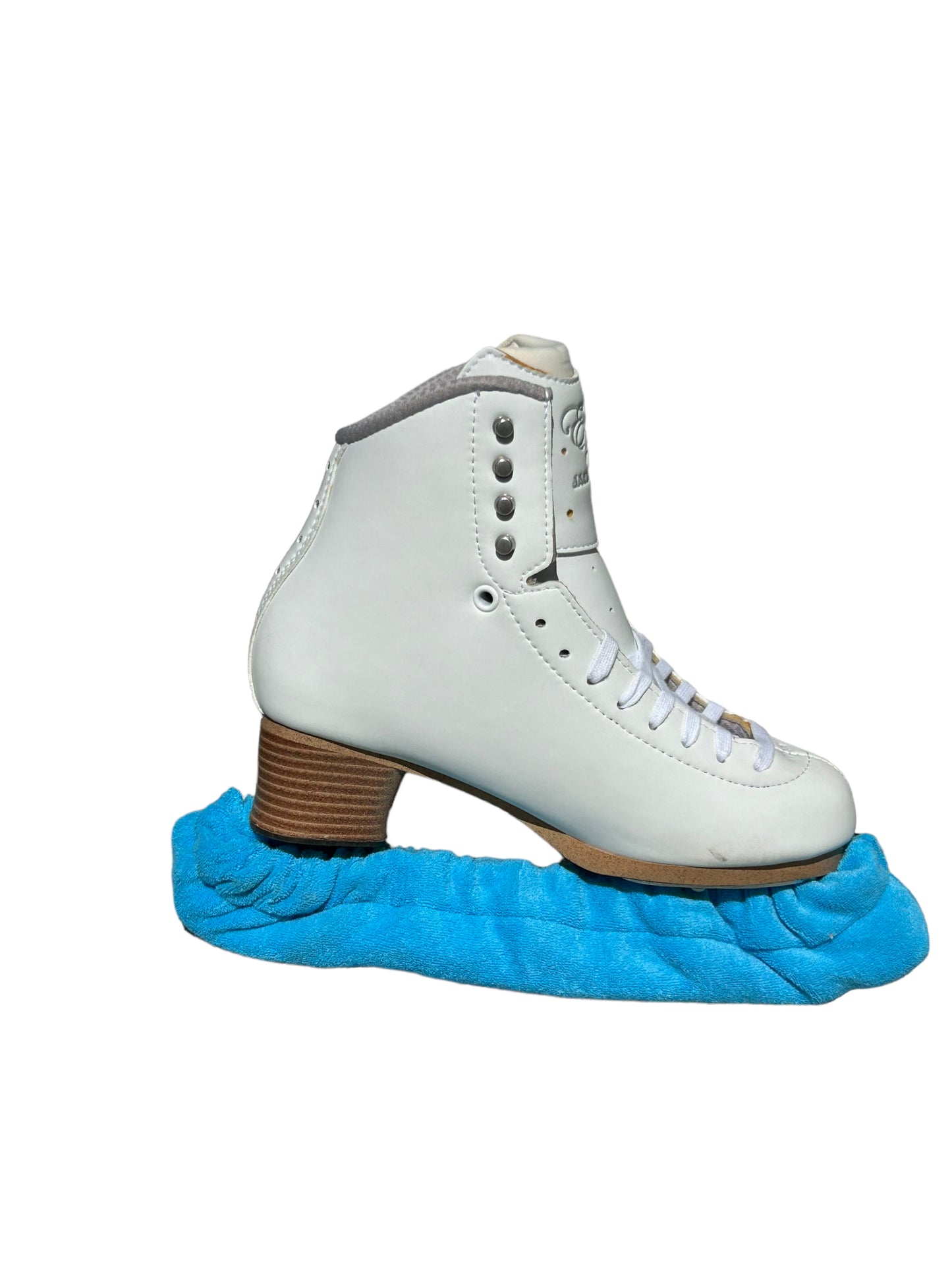 A pair of Skating Eleganza Terry Soakers in soft terry cloth fabric, shown covering skate blades to prevent rust and damage. Sky Blue.