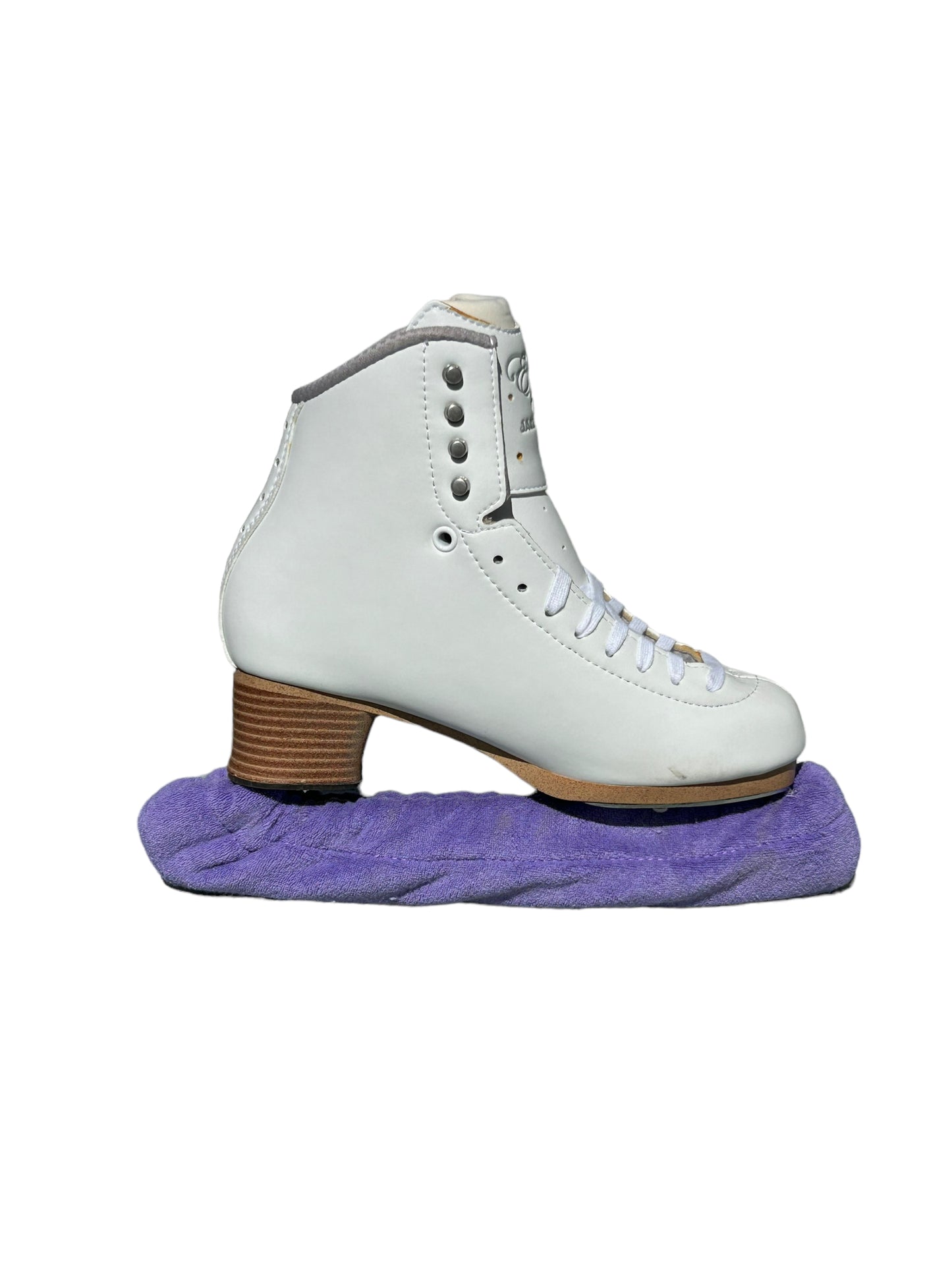 A pair of Skating Eleganza Terry Soakers in soft terry cloth fabric, shown covering skate blades to prevent rust and damage. Violet.