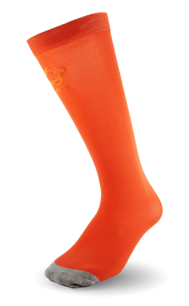 Ultra-thin Thinees skating socks in Orange. Sleek and breathable material designed for figure and hockey skaters
