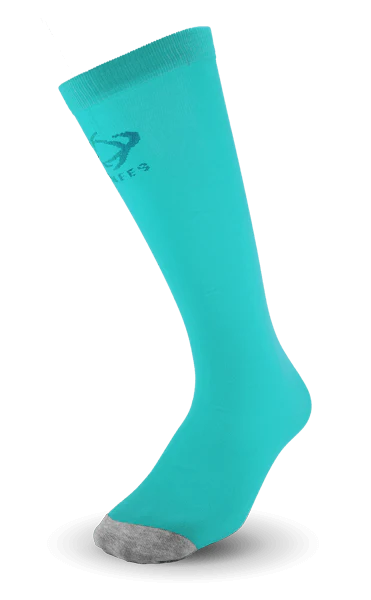 Ultra-thin Thinees skating socks in Teal. Sleek and breathable material designed for figure and hockey skaters
