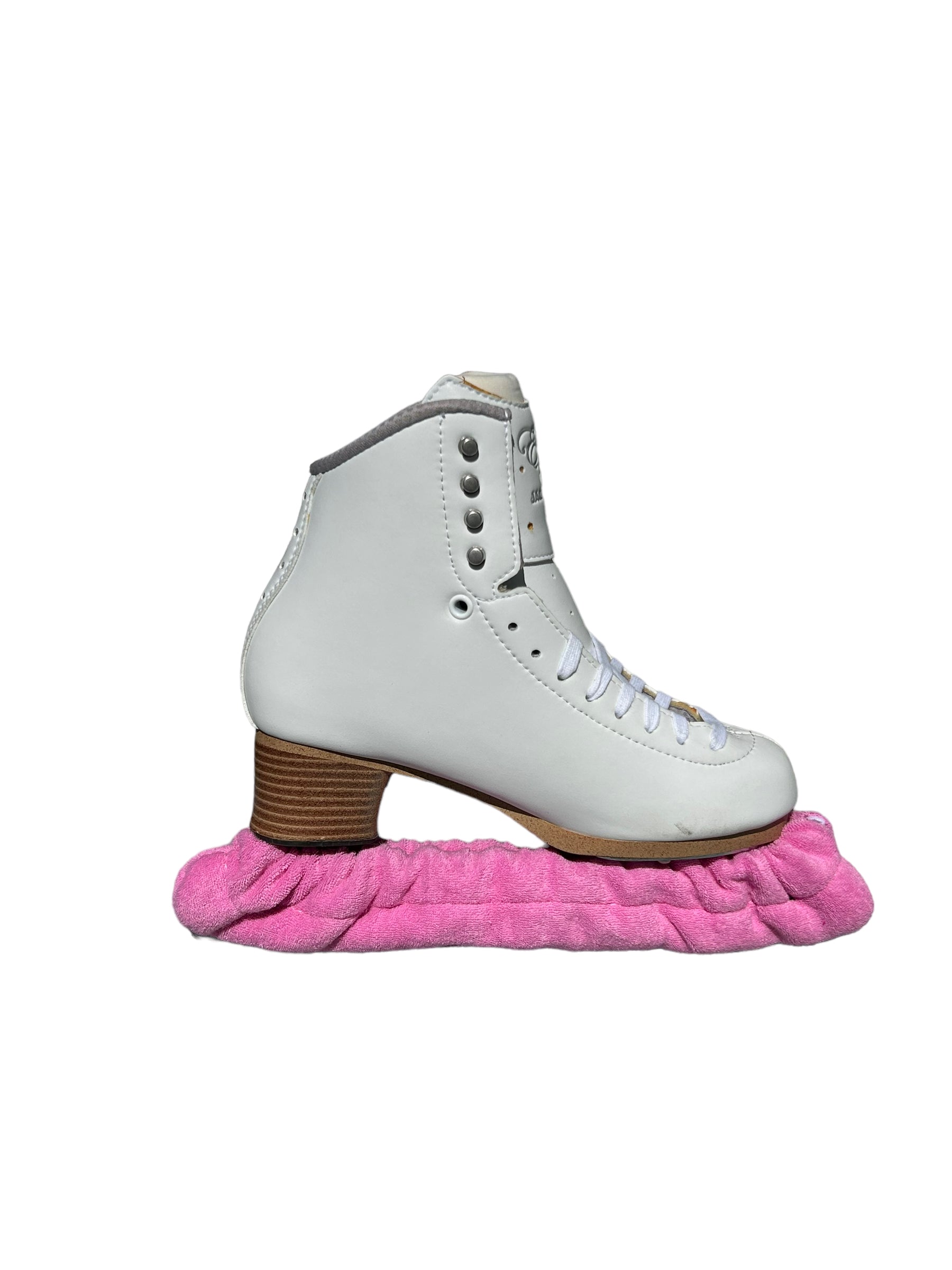 A pair of Skating Eleganza Terry Soakers in soft terry cloth fabric, shown covering skate blades to prevent rust and damage. Light Pink.