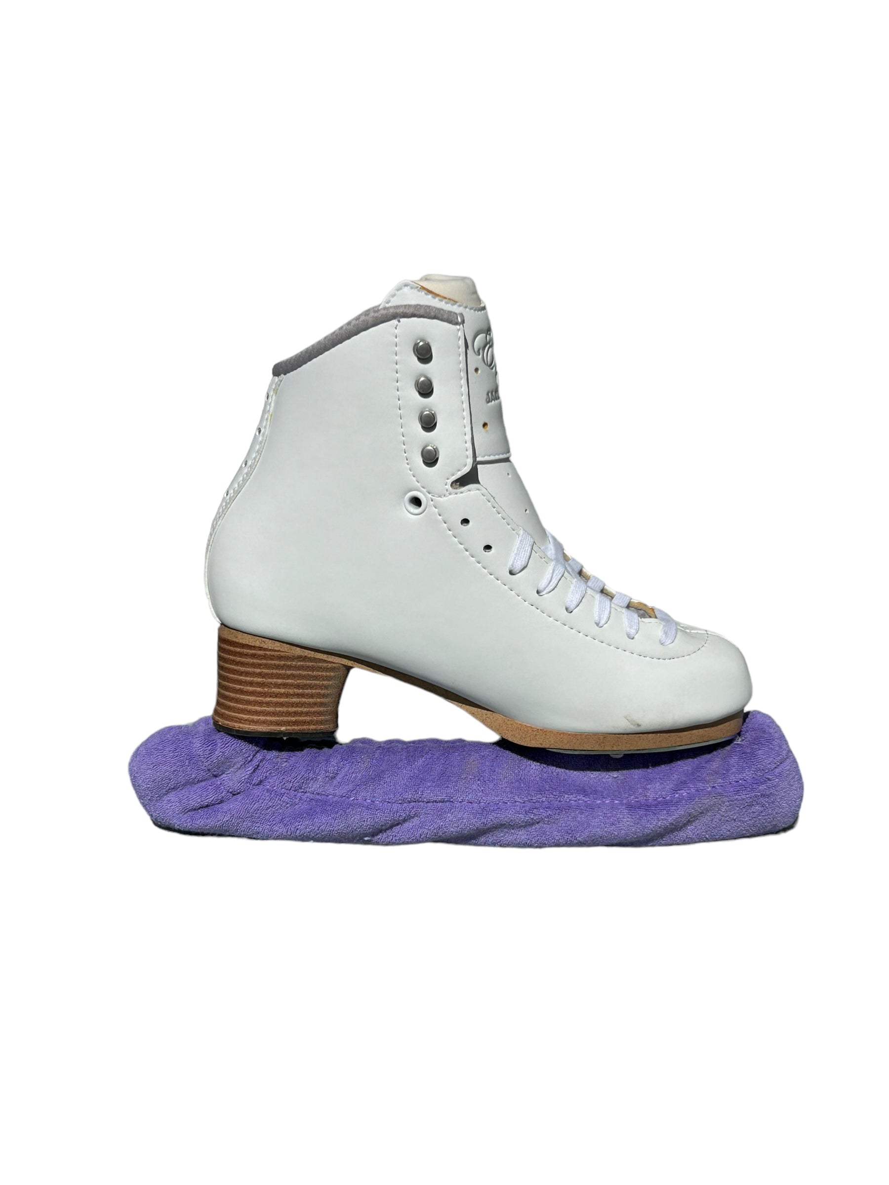 A pair of Skating Eleganza Terry Soakers in soft terry cloth fabric, shown covering skate blades to prevent rust and damage. Violet.